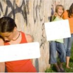 kids bully against wall