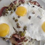 Fried eggs with cheese and bacon