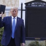 Trump holding a Bible