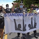 Police standing in solidarity