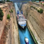 Boat towed between cliffs