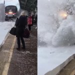 Amtrak train plows snow on people