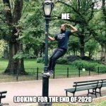 Looking for the end of 2020 | ME; LOOKING FOR THE END OF 2020 | image tagged in looking | made w/ Imgflip meme maker