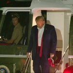 Trump slouching off Marine 1