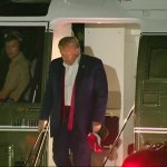 trump slouching off Marine 1 cropped