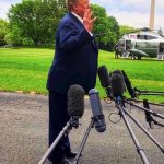 Trump leaning forward because he wears shoe lifts