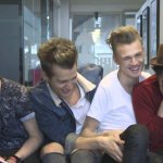 The Vamps Connor, James and Tristan laughing while Brad cries