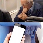 Old man holding a phone