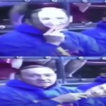 guy wears face mask of himself