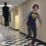 Guy running from levitating guy