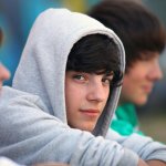 Teenage boy in hoodie
