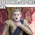 Trying the impossible | PHOTOGRAPHER: SAY CHEESE! VEGANS: | image tagged in joffrey chokes | made w/ Imgflip meme maker