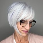 old woman glasses 50s gray hair