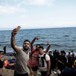 Migrants with phone