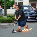fat guy on scooter