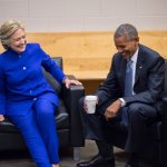 Clinton and Obama laughing