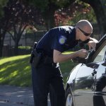 Cop Pulling Over Car