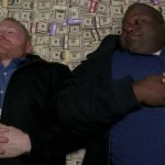 People lying on money