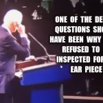 Why did Biden refuse to be inspected for an ear piece?