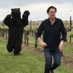 Kyle MacLachlan running away from bear