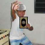 Scared kid holding Quran meme