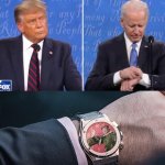 Biden checks watch during debate