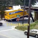 Truck hits 11 foot 8 bridge