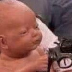 Baby with gun meme