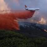 Plane drops Fire retardant
