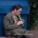 Dwight playing somber song