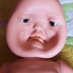Dented doll face