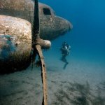 Sunken airplane scuba diver