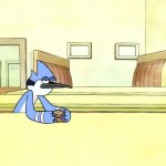 Mordecai sitting in a coffee shop