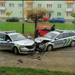 Police car crashes