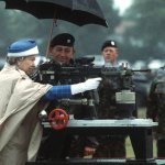 Queen Elizabeth Shooting A Machine Gun