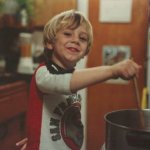 Kid stirring pot