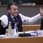 Macron happy arms