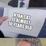 old meme | NYAN CAT IS ALMOST 10 YEARS OLD | image tagged in trump shows paper | made w/ Imgflip meme maker