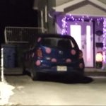Blue Nissan Micra with pink polka dots 2