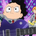 Mineta trying to play the guitar