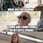 Capt Marvel and Stan Lee | WHAT ARE YOU READING; TERMS AND CONDITIONS ON MY APPLE IPHONE; ENTERTAINING | image tagged in smug stan lee,stan lee | made w/ Imgflip meme maker