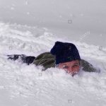 MAN BURIED IN SNOW