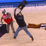 Guy hitting mascot with chair