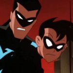 Robin and Nightwing glare