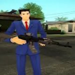 Guy wearing blue suit with gun