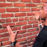 guy talking to wall