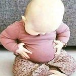 Baby looking at stomach