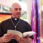 Priest reading bible