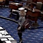 Kyrsten Sinema thumbs down