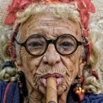 Old lady smoking cigar